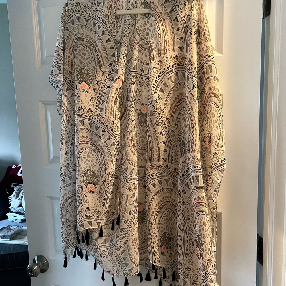One size fits all poncho type-with arm area sewn in as well-womens